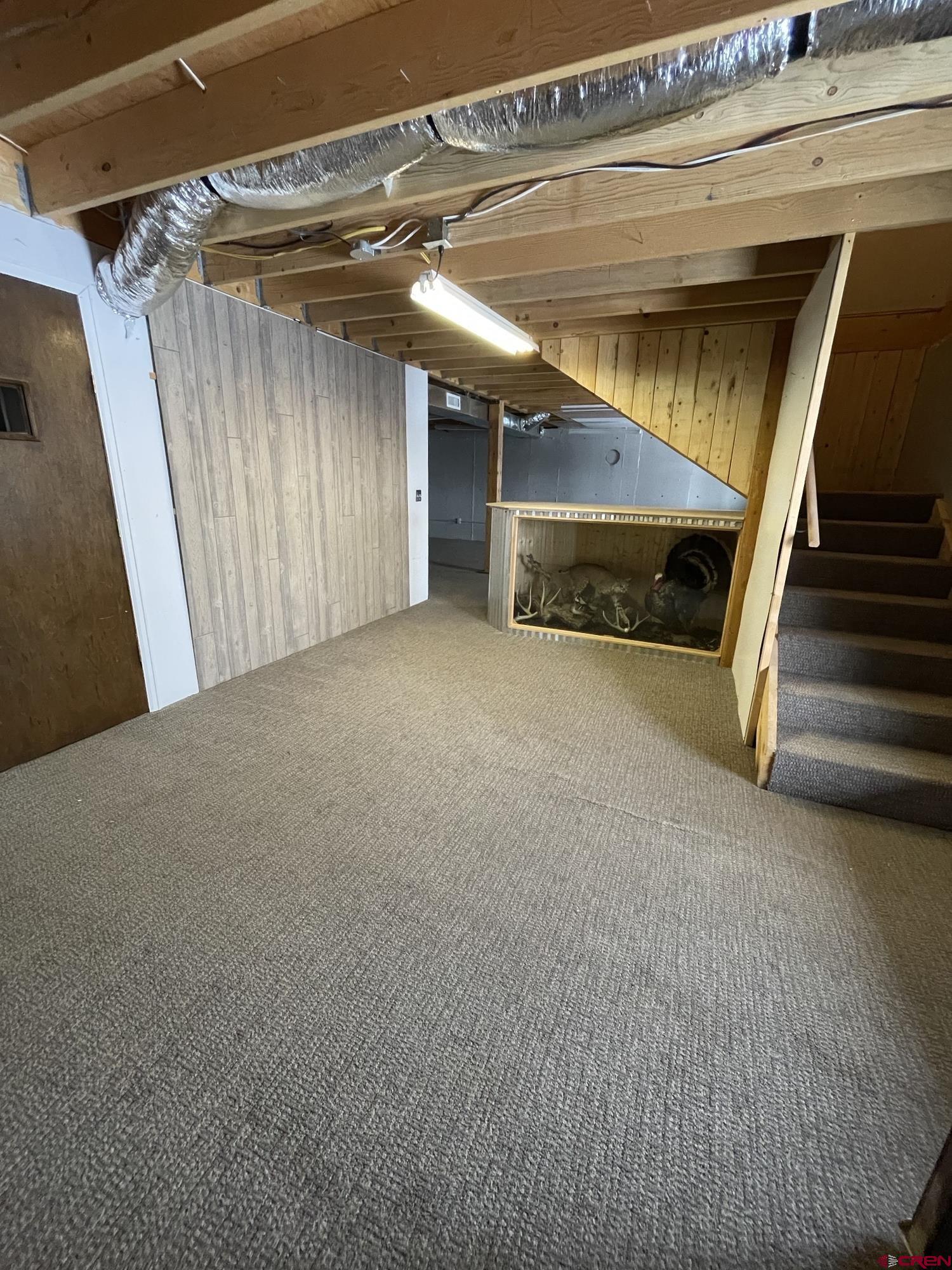 21430 Highway 550 Ridgway, CO 81432 - Photo 24 of 35 a view of an empty room with stairs