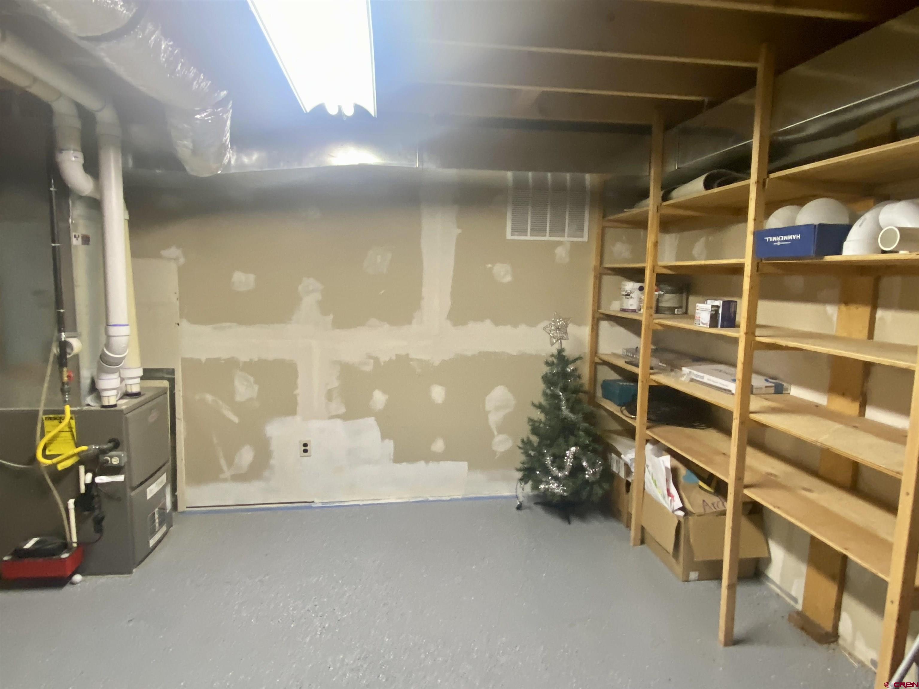 21430 Highway 550 Ridgway, CO 81432 - Photo 27 of 35 a view of walk in closet with clothes and shoes