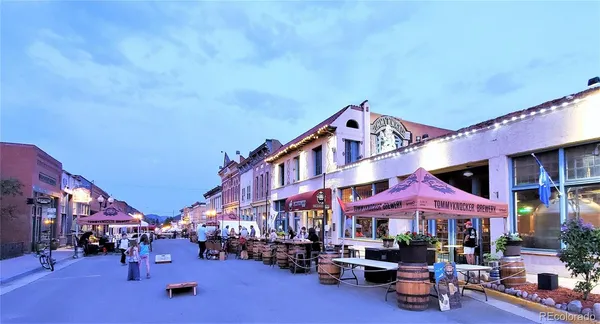 a view of a street with cars