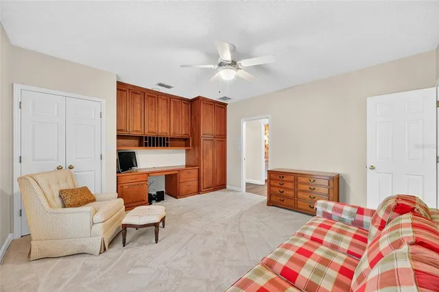 a bedroom with furniture and a fireplace