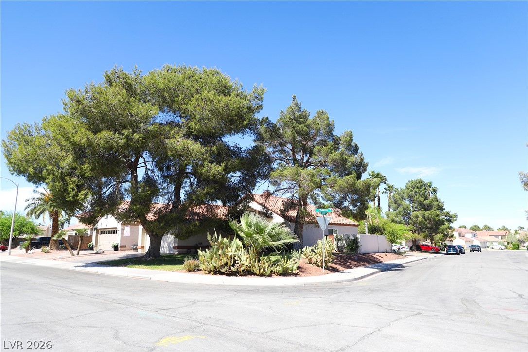 133 Coventry Circle Henderson, NV 89074 - Photo 3 of 99 Corner Lot - front & side of home at Coventry Circle & Coventry Drive.