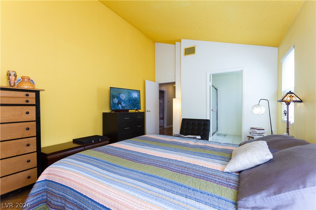 133 Coventry Circle Henderson, NV 89074 - Photo 42 of 99 Primary bedroom - exit to hallway and entrance to primary bathroom