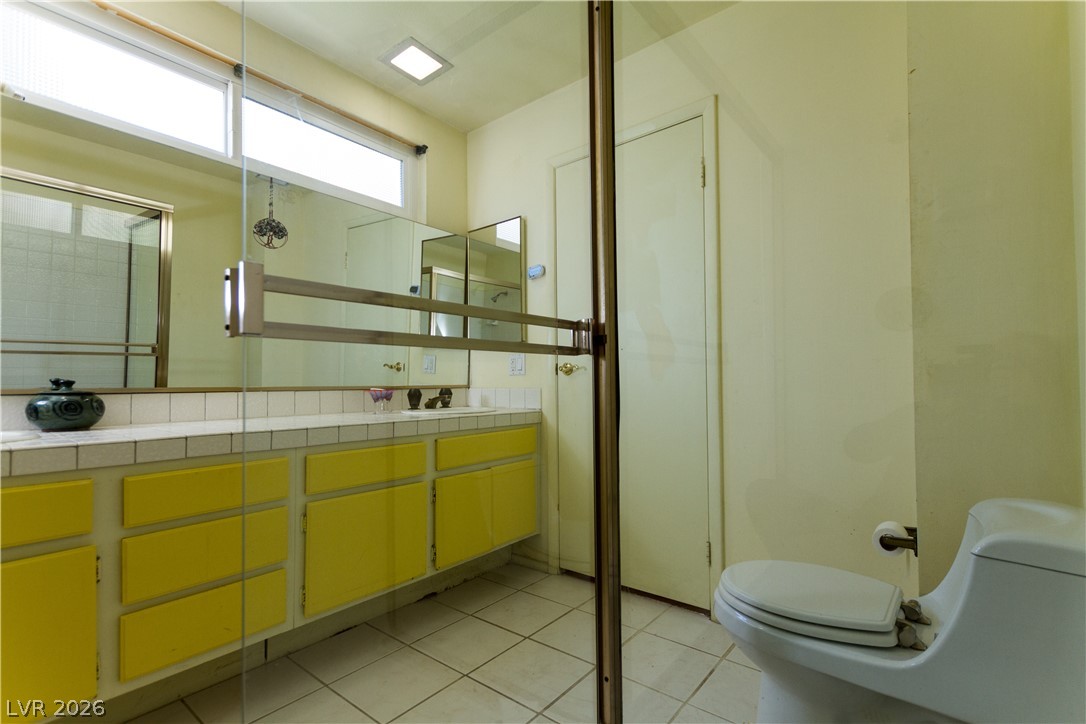 133 Coventry Circle Henderson, NV 89074 - Photo 44 of 99 Primary bathroom with shower & double sinks