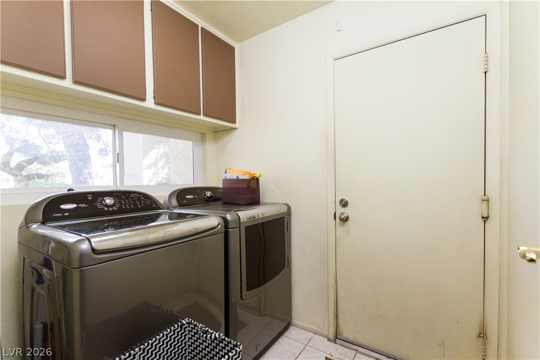 133 Coventry Circle Henderson, NV 89074 - Photo 52 of 99 Laundryroom & exit to Garage