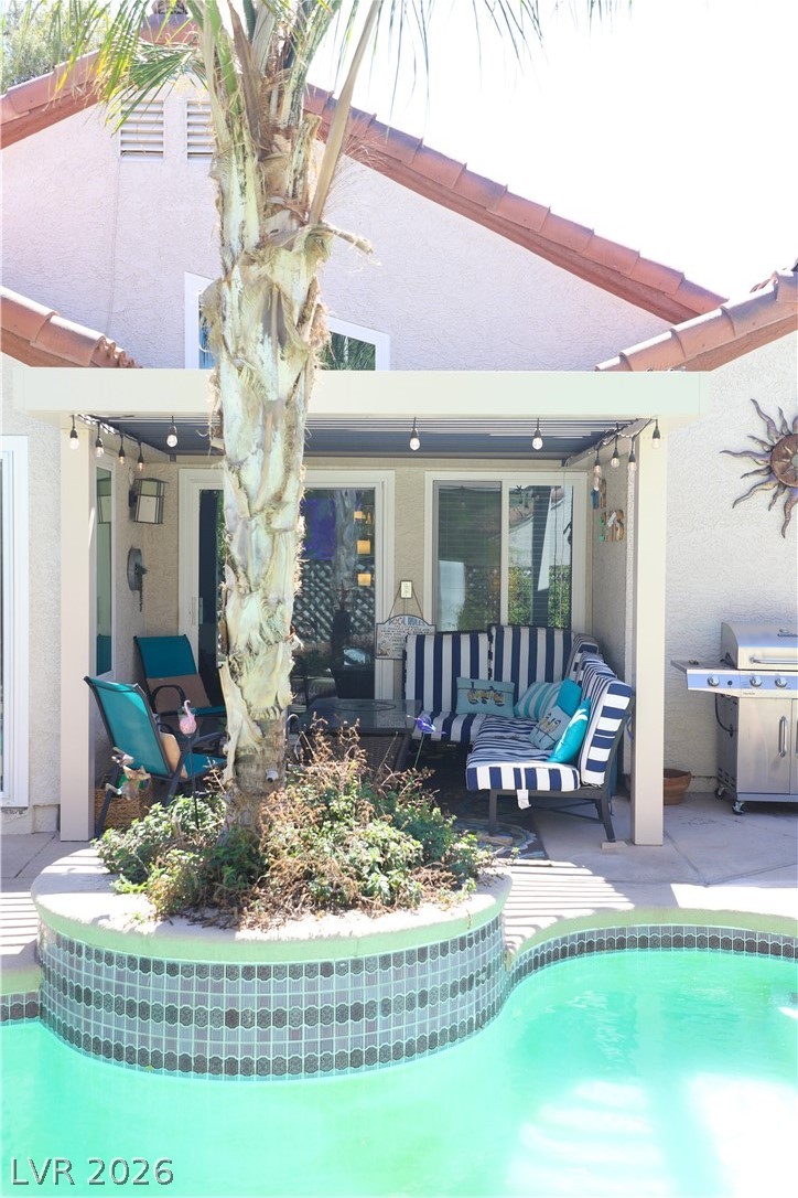 133 Coventry Circle Henderson, NV 89074 - Photo 77 of 99 Portico at rear of home provides shelter & shade.