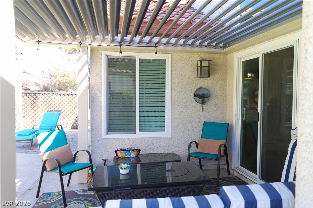 133 Coventry Circle Henderson, NV 89074 - Photo 80 of 99 Patio with louvers open. Note new vinyl windows & doors.