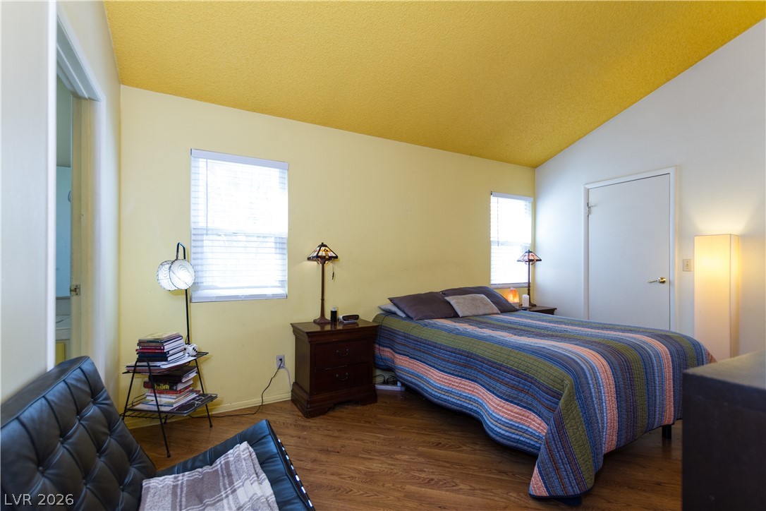 133 Coventry Circle Henderson, NV 89074 - Photo 8 of 99 Primary bedroom sitting area. Primary bathroom to left. Walk-in closet to right.