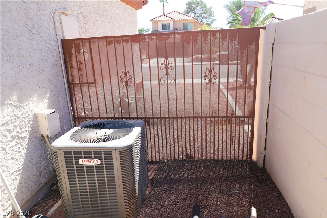 133 Coventry Circle Henderson, NV 89074 - Photo 87 of 99 AC unit at side of structure