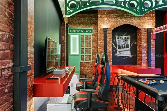 a view of an chairs and table in the balcony