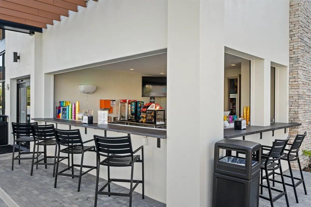 10317 Ebb Tide Lane Orlando, FL 32821 - Photo 45 of 47 a view of a dining room with furniture