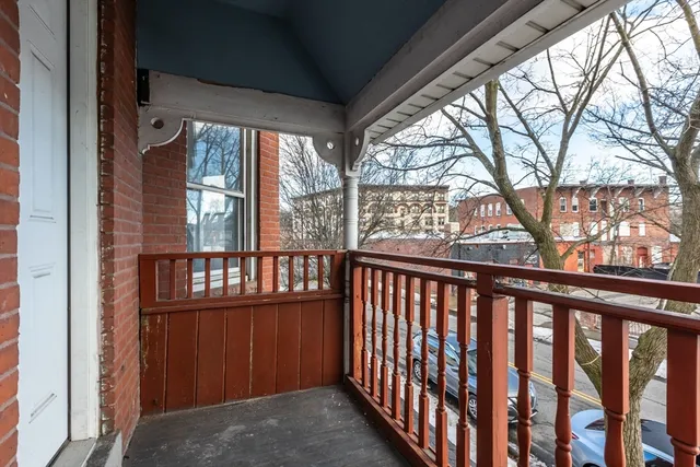 a view of a porch with a yard