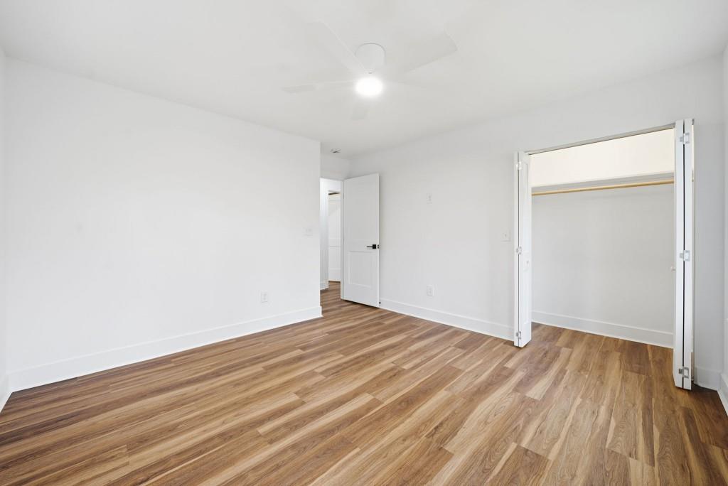 3668 Big Springs Road Decatur, GA 30034 - Photo 24 of 45 a view of an empty room with wooden floor
