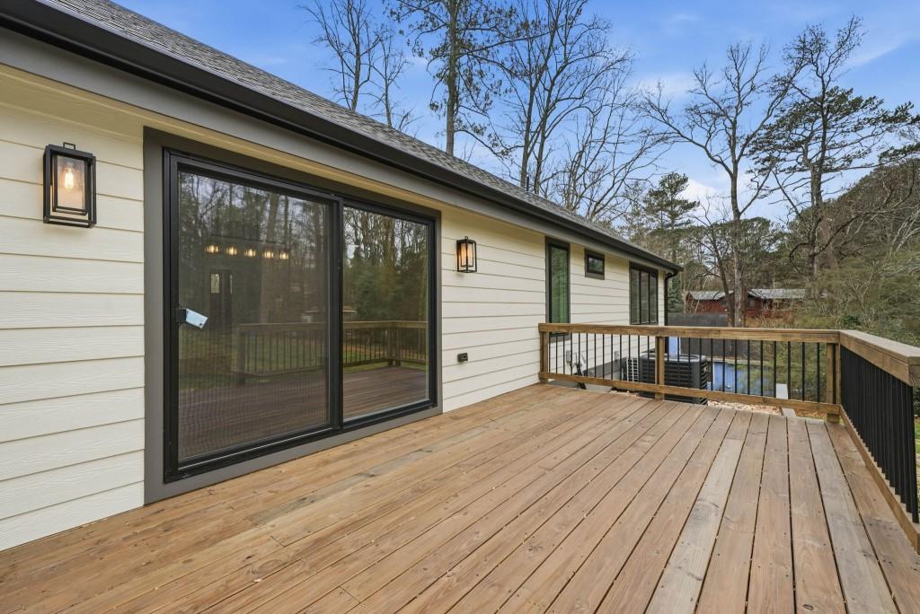 3668 Big Springs Road Decatur, GA 30034 - Photo 34 of 45 a view of a house with a roof deck