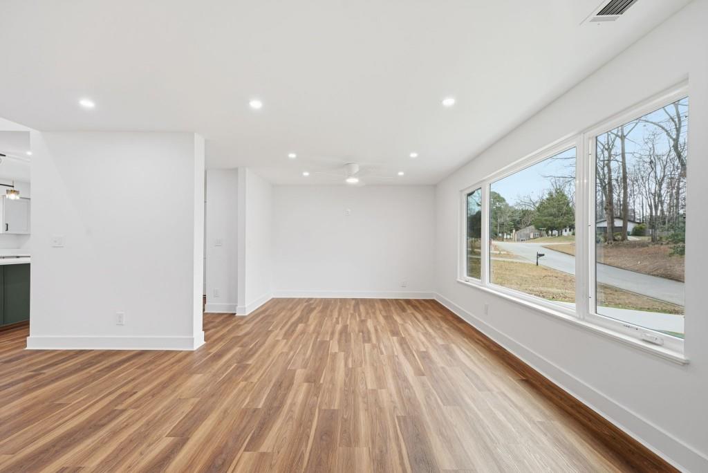 3668 Big Springs Road Decatur, GA 30034 - Photo 6 of 45 a view of room with window and wooden floor