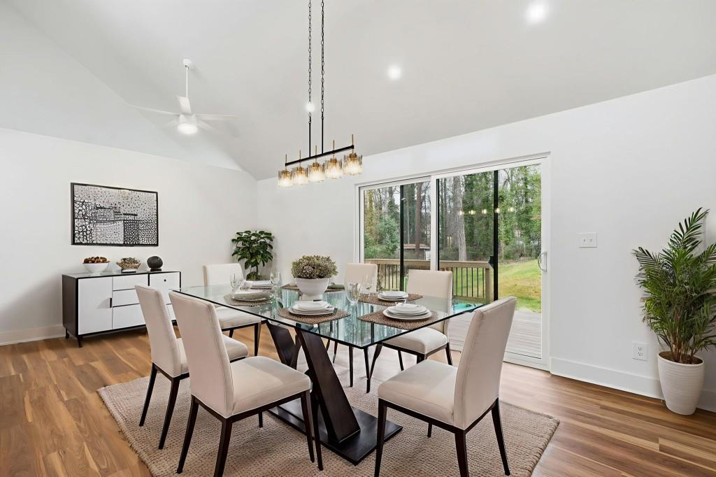 3668 Big Springs Road Decatur, GA 30034 - Photo 8 of 45 a view of a dining room with furniture window and wooden floor