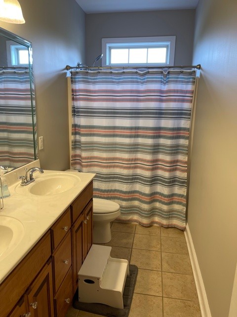 729 Heritage Road Lebanon, TN 37087 - Photo 22 of 29 a bathroom with a sink and a mirror