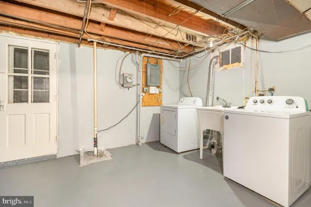 a utility room with dryer and washer