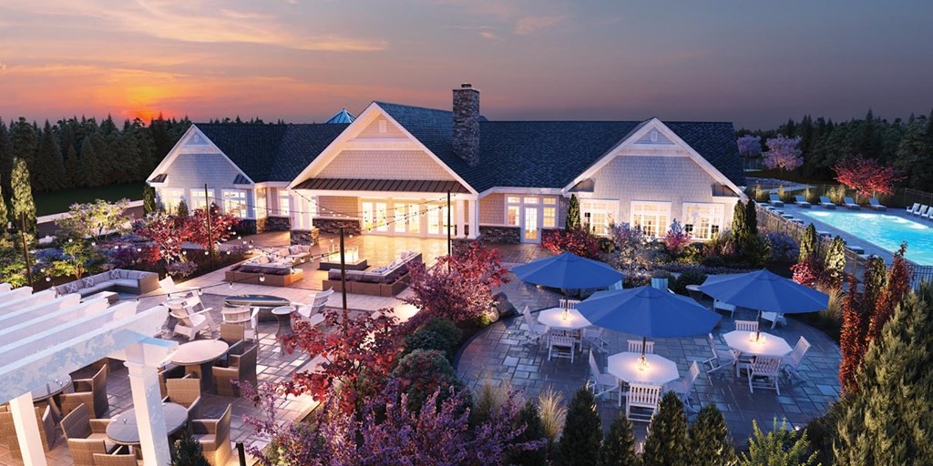 11 Hummingbird Way, Unit 148 Methuen, MA 01844 - Photo 11 of 16 a group of people sitting in front of a house