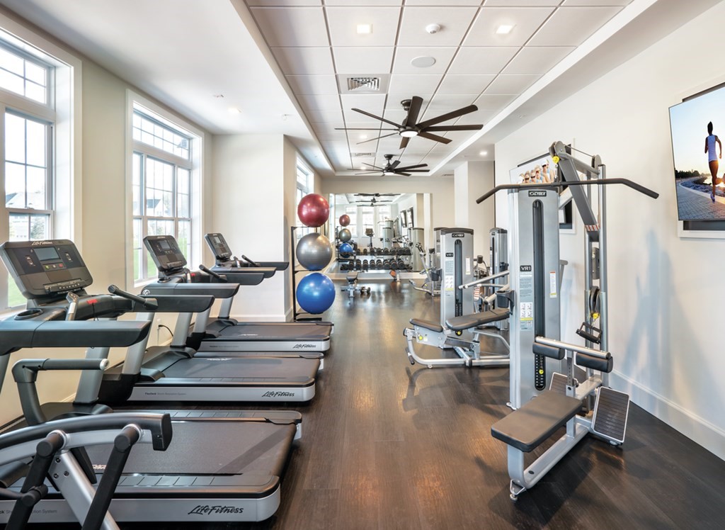 11 Hummingbird Way, Unit 148 Methuen, MA 01844 - Photo 14 of 16 a view of a room with gym equipment