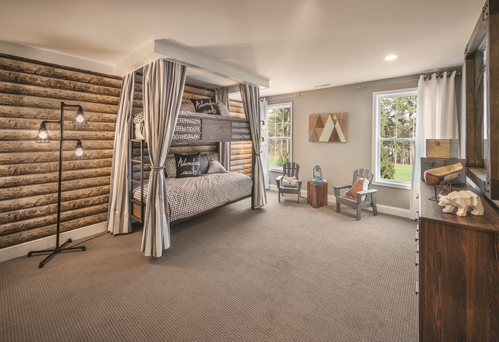 11 Hummingbird Way, Unit 148 Methuen, MA 01844 - Photo 6 of 16 a bedroom with furniture and a window