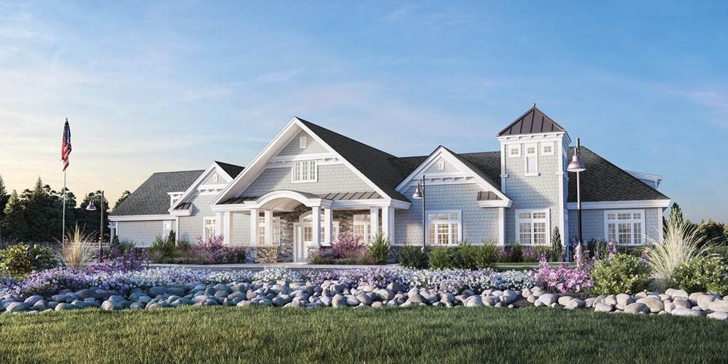 11 Hummingbird Way, Unit 148 Methuen, MA 01844 - Photo 9 of 16 a front view of a house with a garden