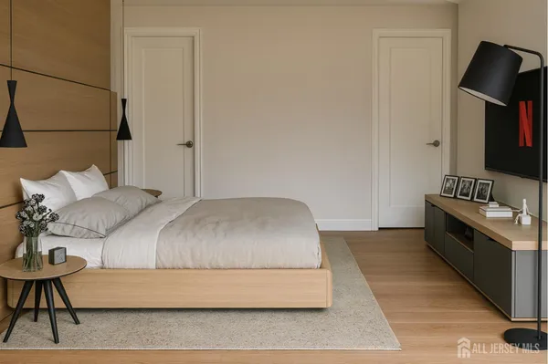 a bedroom with a bed and a couch