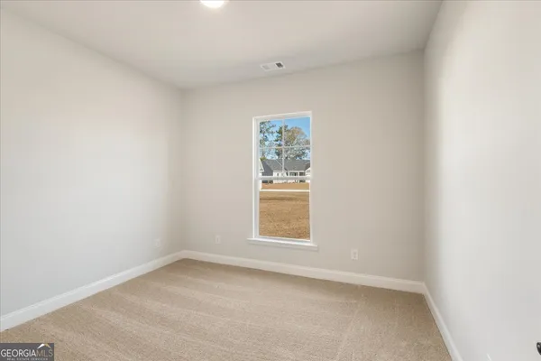 an empty room with a window