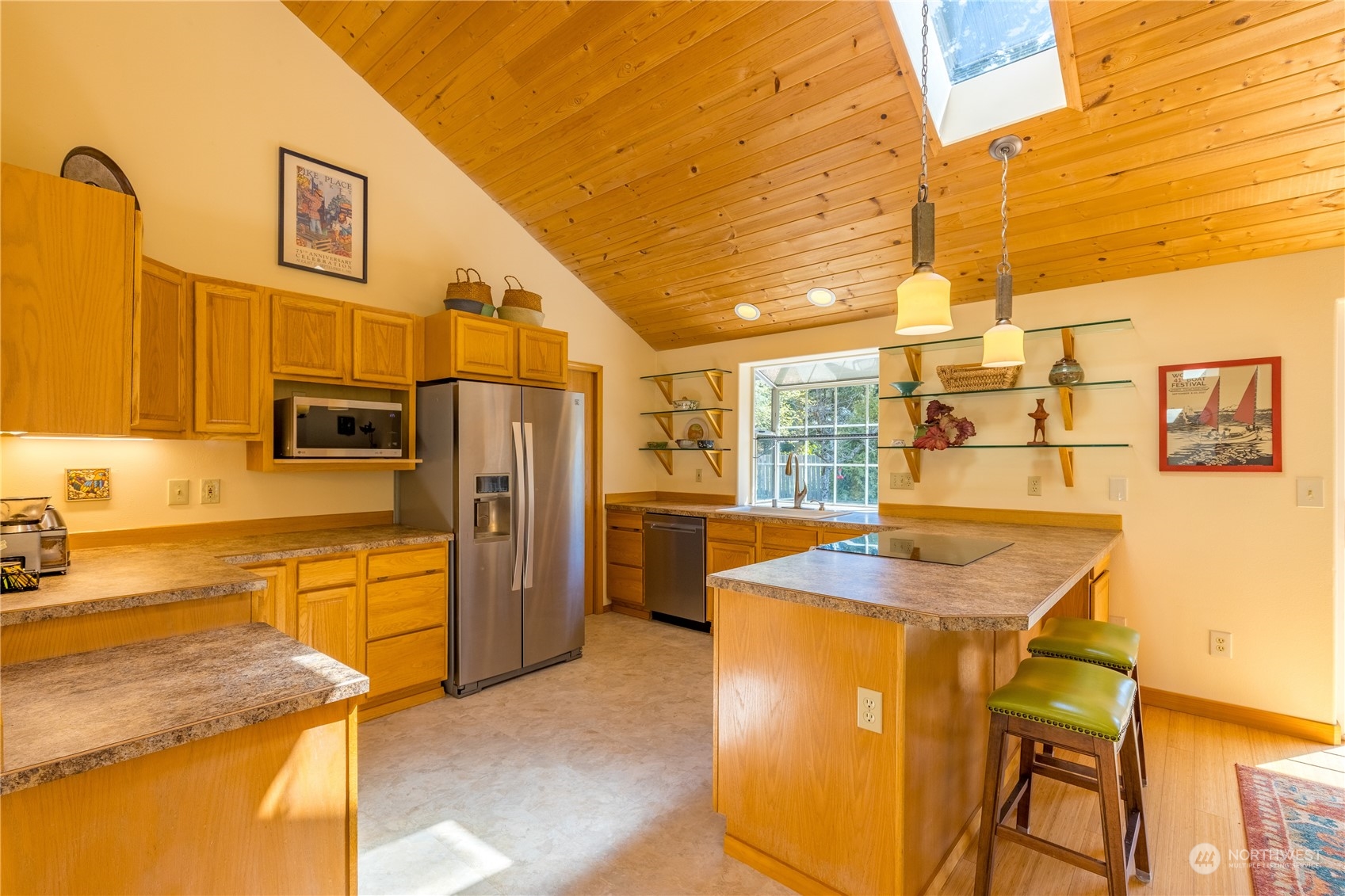 131 Riverside Road Sequim, WA 98382 - Photo 11 of 40 a kitchen that has a sink and a refrigerator