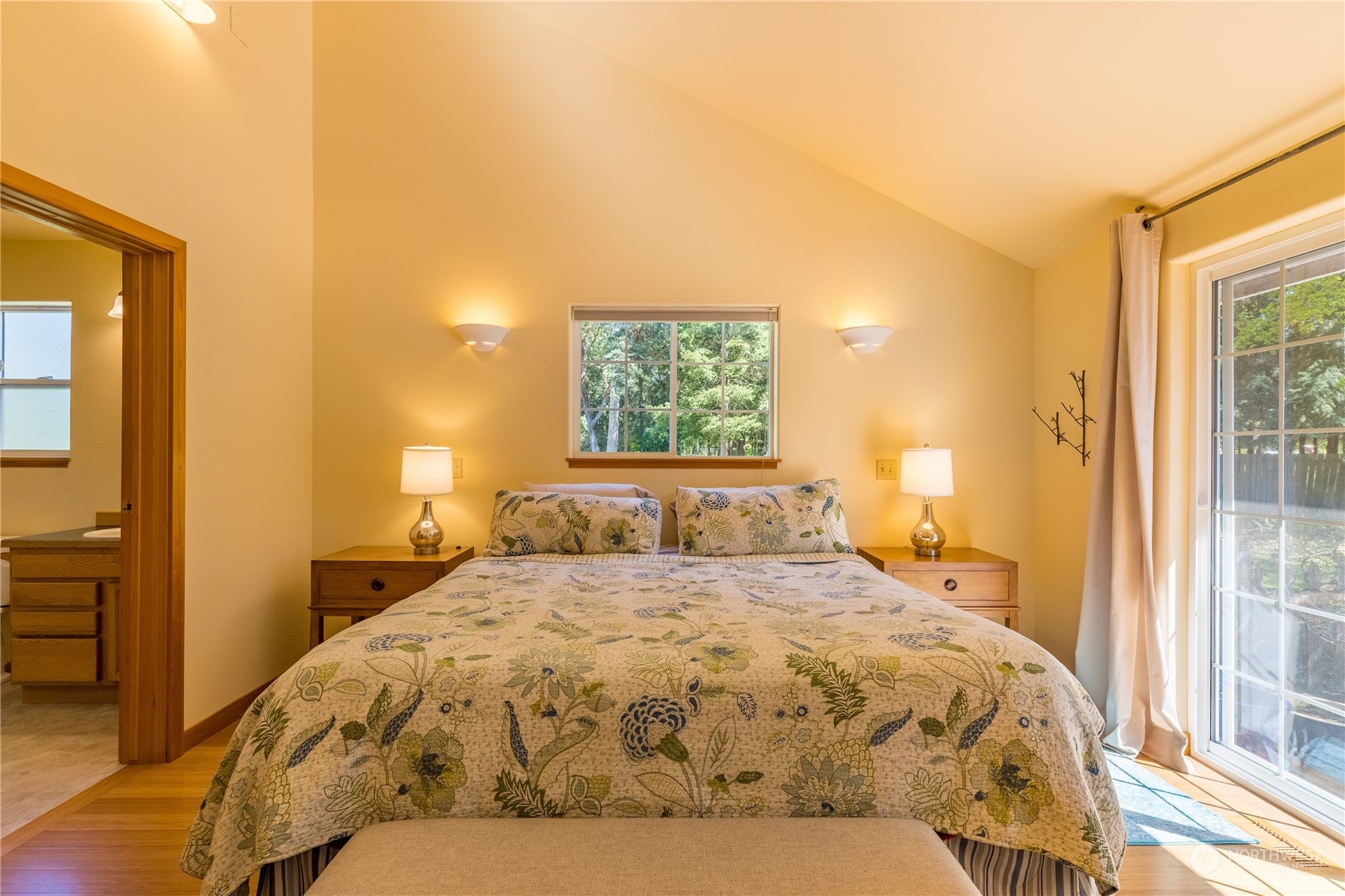 131 Riverside Road Sequim, WA 98382 - Photo 22 of 40 a bedroom with a bed and a window