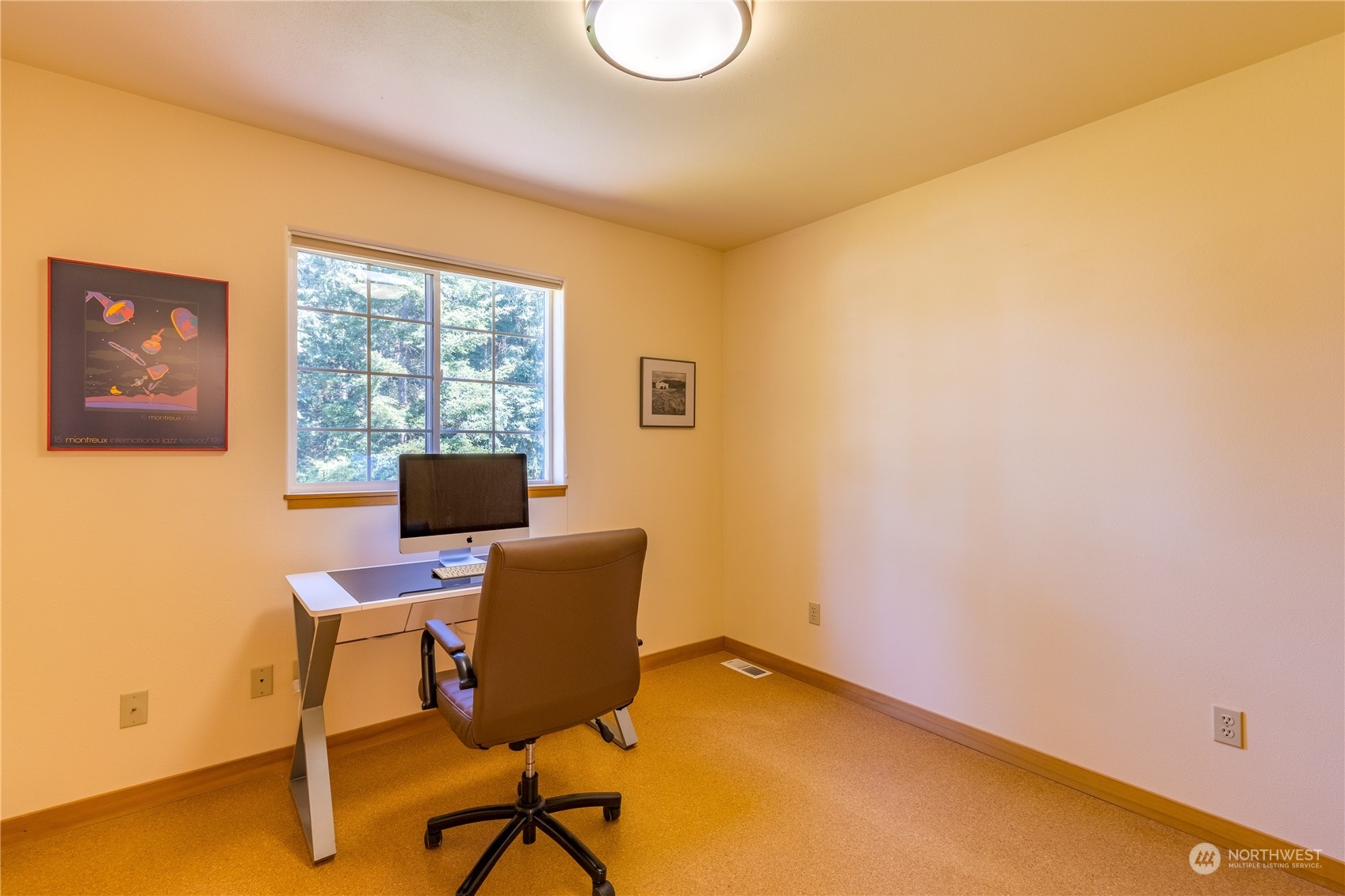 131 Riverside Road Sequim, WA 98382 - Photo 29 of 40 a view of a workspace with furniture and a window