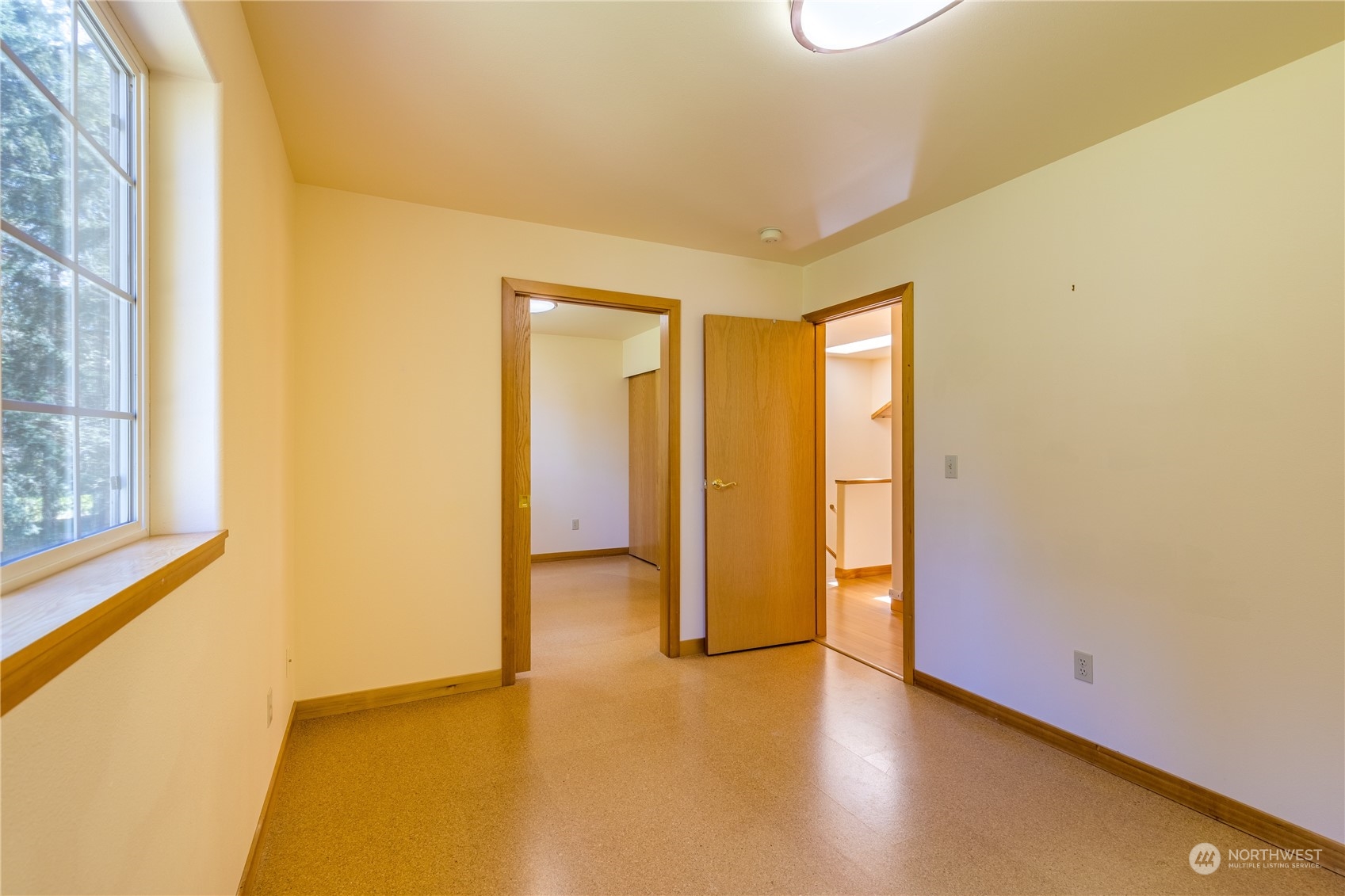 131 Riverside Road Sequim, WA 98382 - Photo 31 of 40 a view of an empty room with glass door