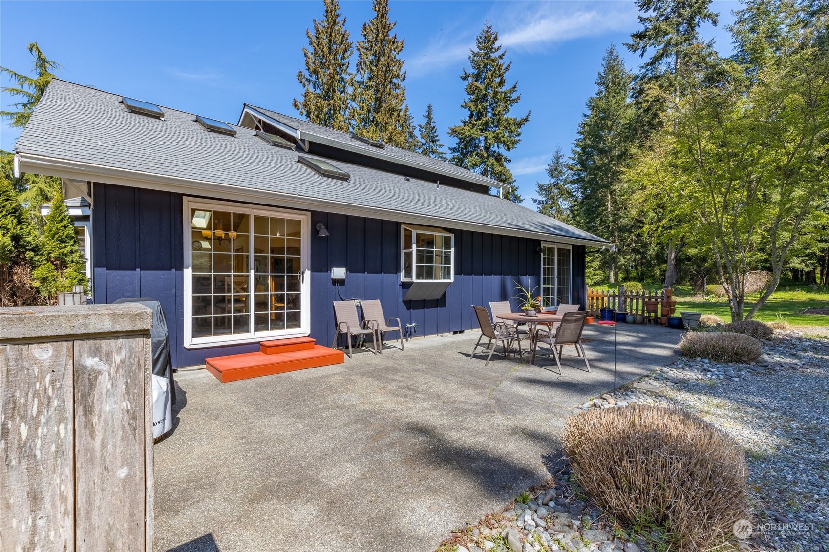 131 Riverside Road Sequim, WA 98382 - Photo 34 of 40 a view of a house with backyard porch and sitting area