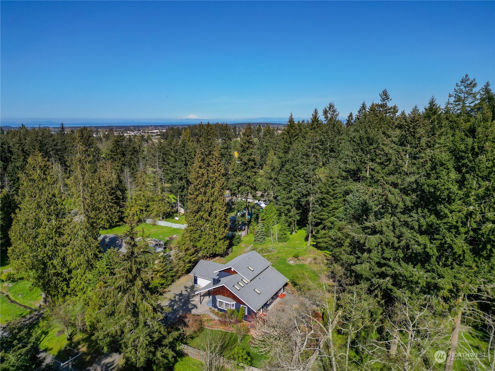131 Riverside Road Sequim, WA 98382 - Photo 39 of 40 an aerial view of a house with a yard