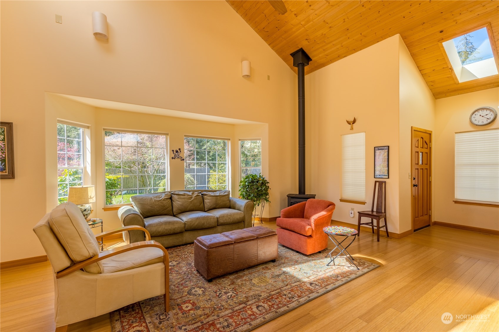 131 Riverside Road Sequim, WA 98382 - Photo 6 of 40 a living room with furniture and floor to ceiling windows