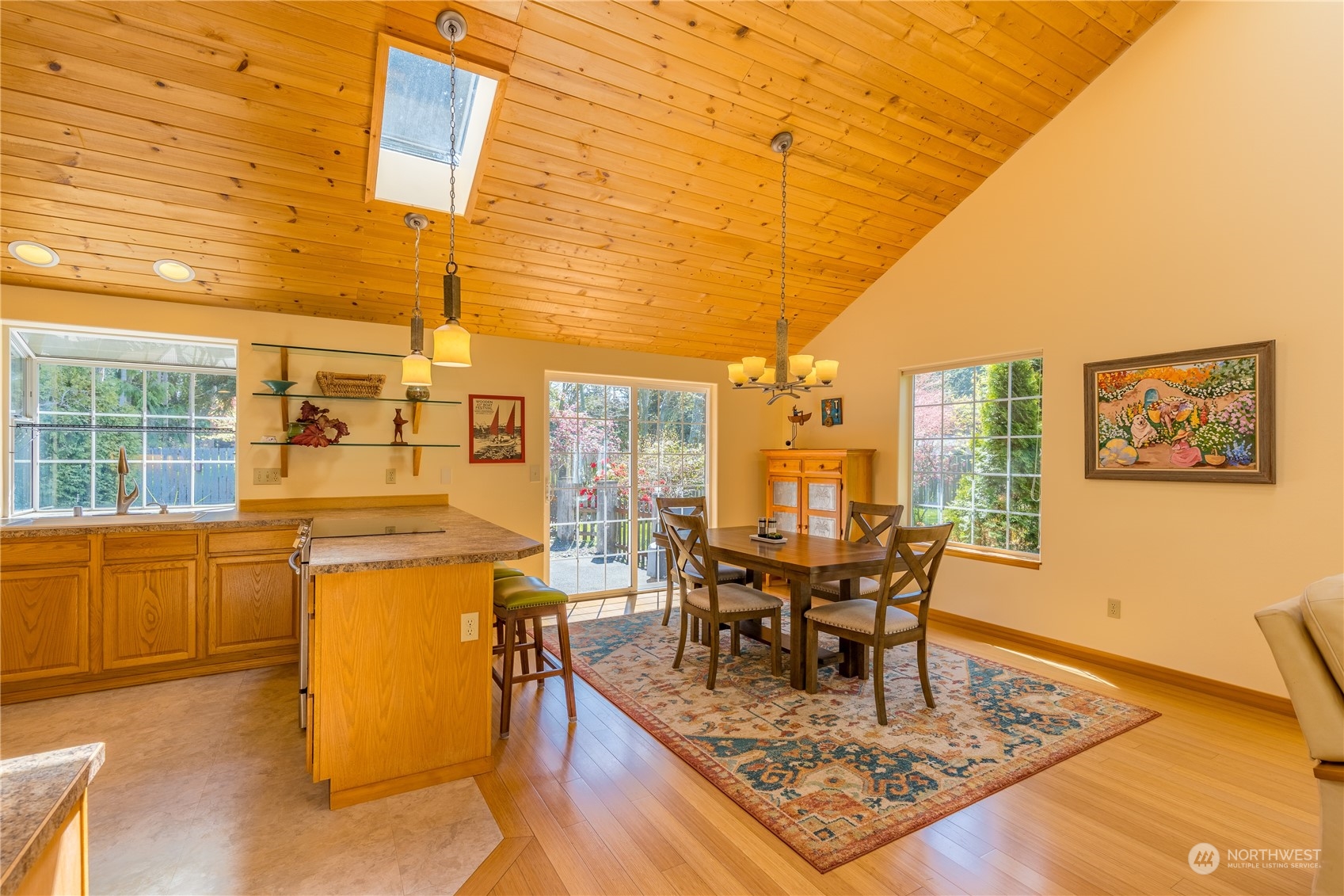 131 Riverside Road Sequim, WA 98382 - Photo 9 of 40 a living room with furniture a rug and a floor to ceiling window