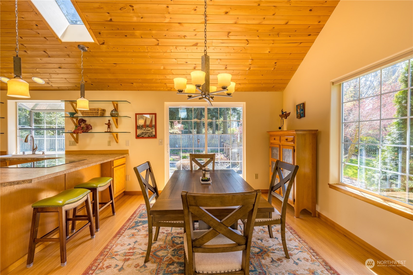 131 Riverside Road Sequim, WA 98382 - Photo 10 of 40 a dining room with furniture and wooden floor