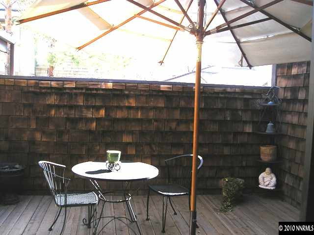 326 West Riverview Circle Reno, NV 89509 - Photo 8 of 9 a backyard of a house with table and chairs