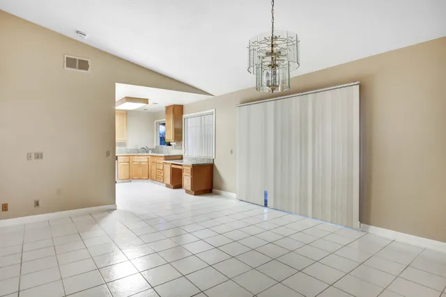 a view of a kitchen with a sink