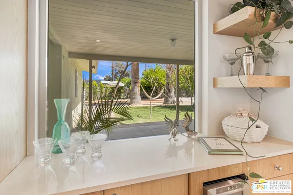 a very nice looking kitchen with a large window