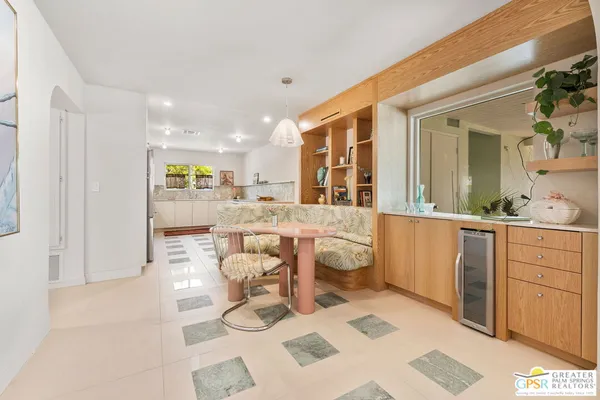 a kitchen with stainless steel appliances granite countertop a stove and a refrigerator