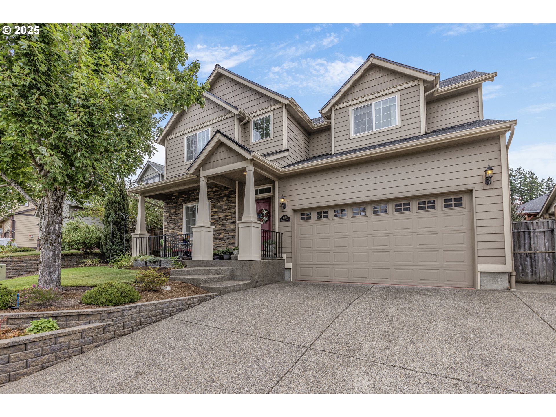 3369 Falcon Drive Springfield, OR 97477 - Photo 1 of 47 a front view of a house with a yard and garage