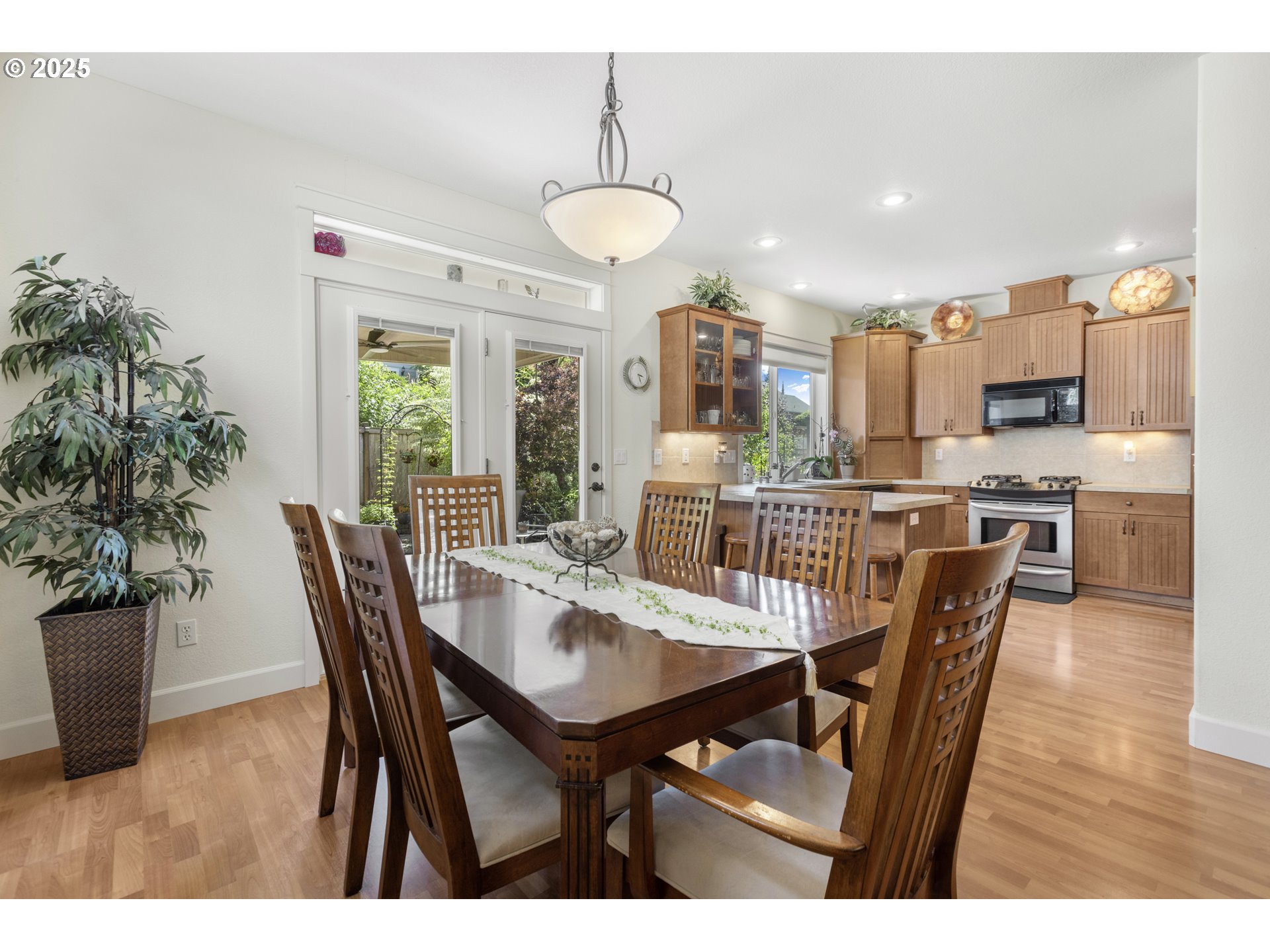3369 Falcon Drive Springfield, OR 97477 - Photo 15 of 47 a view of a dining room with furniture window and wooden floor