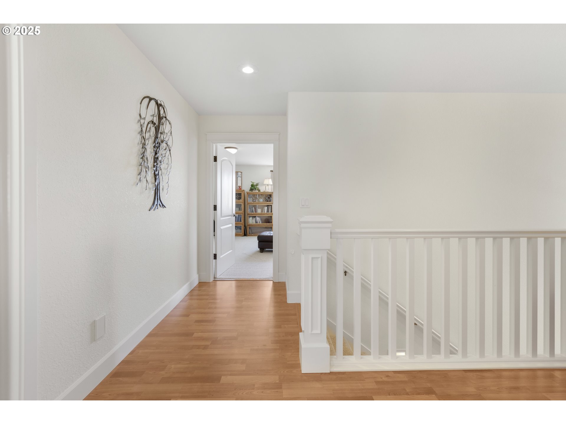 3369 Falcon Drive Springfield, OR 97477 - Photo 31 of 47 a view of a hallway with wooden floor