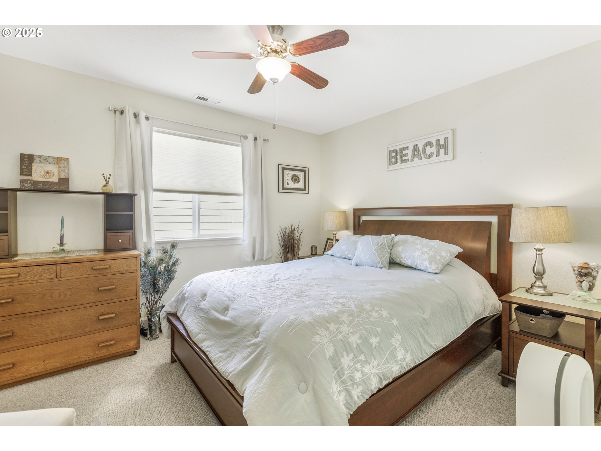 3369 Falcon Drive Springfield, OR 97477 - Photo 35 of 47 a bedroom with a bed and a dresser