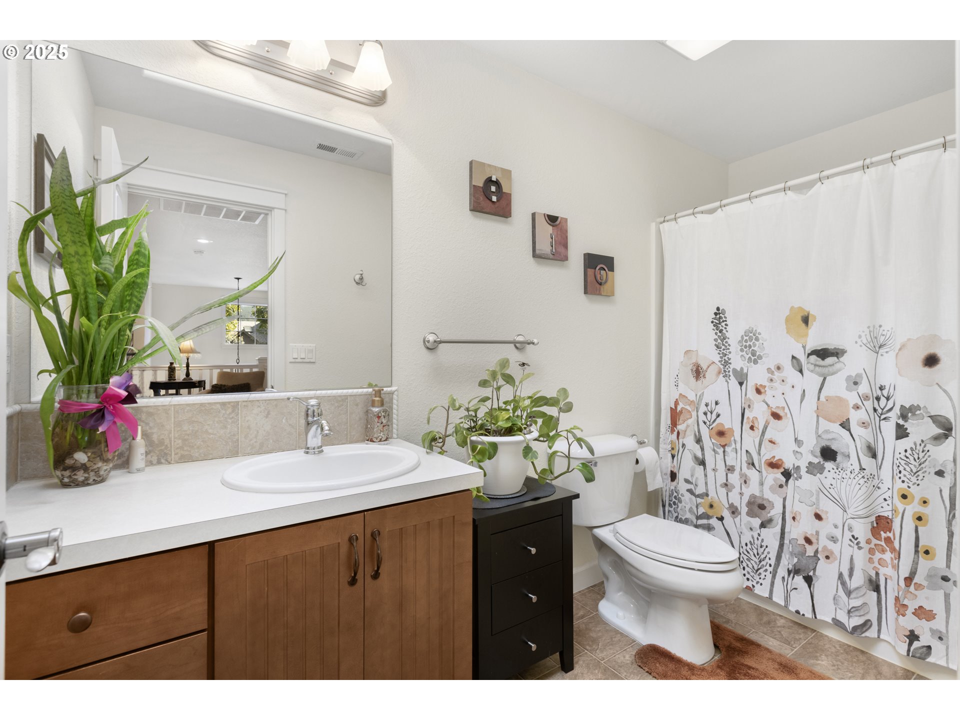 3369 Falcon Drive Springfield, OR 97477 - Photo 37 of 47 a bathroom with a sink mirror vanity and toilet