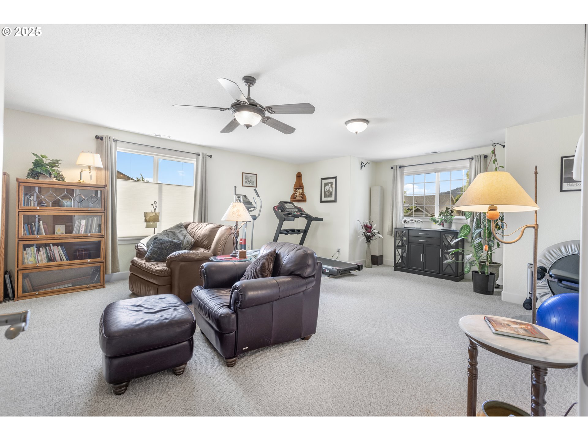 3369 Falcon Drive Springfield, OR 97477 - Photo 38 of 47 a living room with furniture a lamp and a window