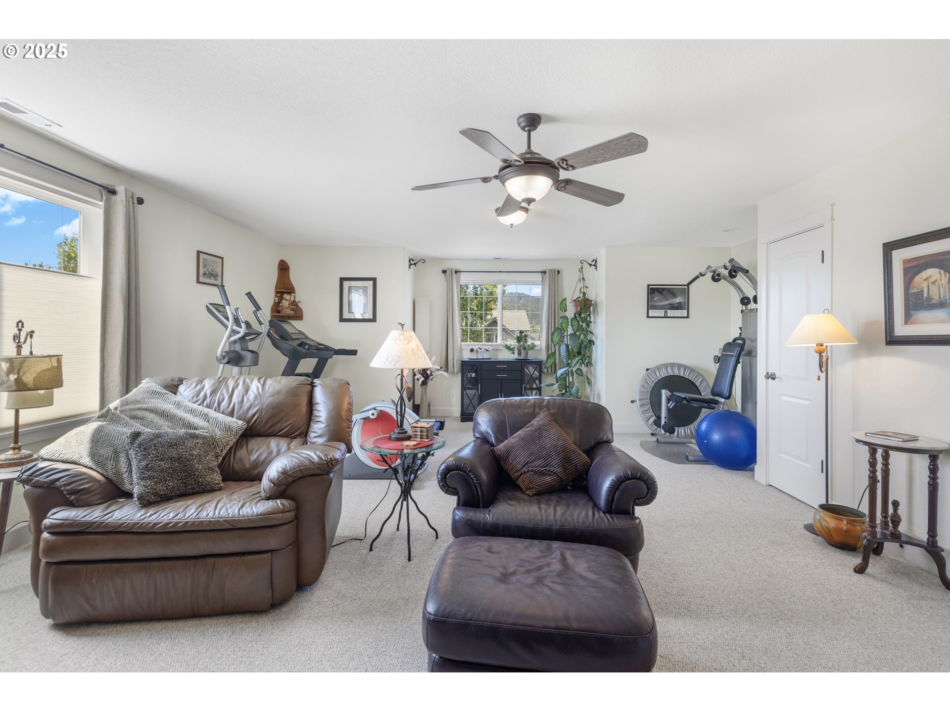 3369 Falcon Drive Springfield, OR 97477 - Photo 39 of 47 a living room with furniture and a flat screen tv