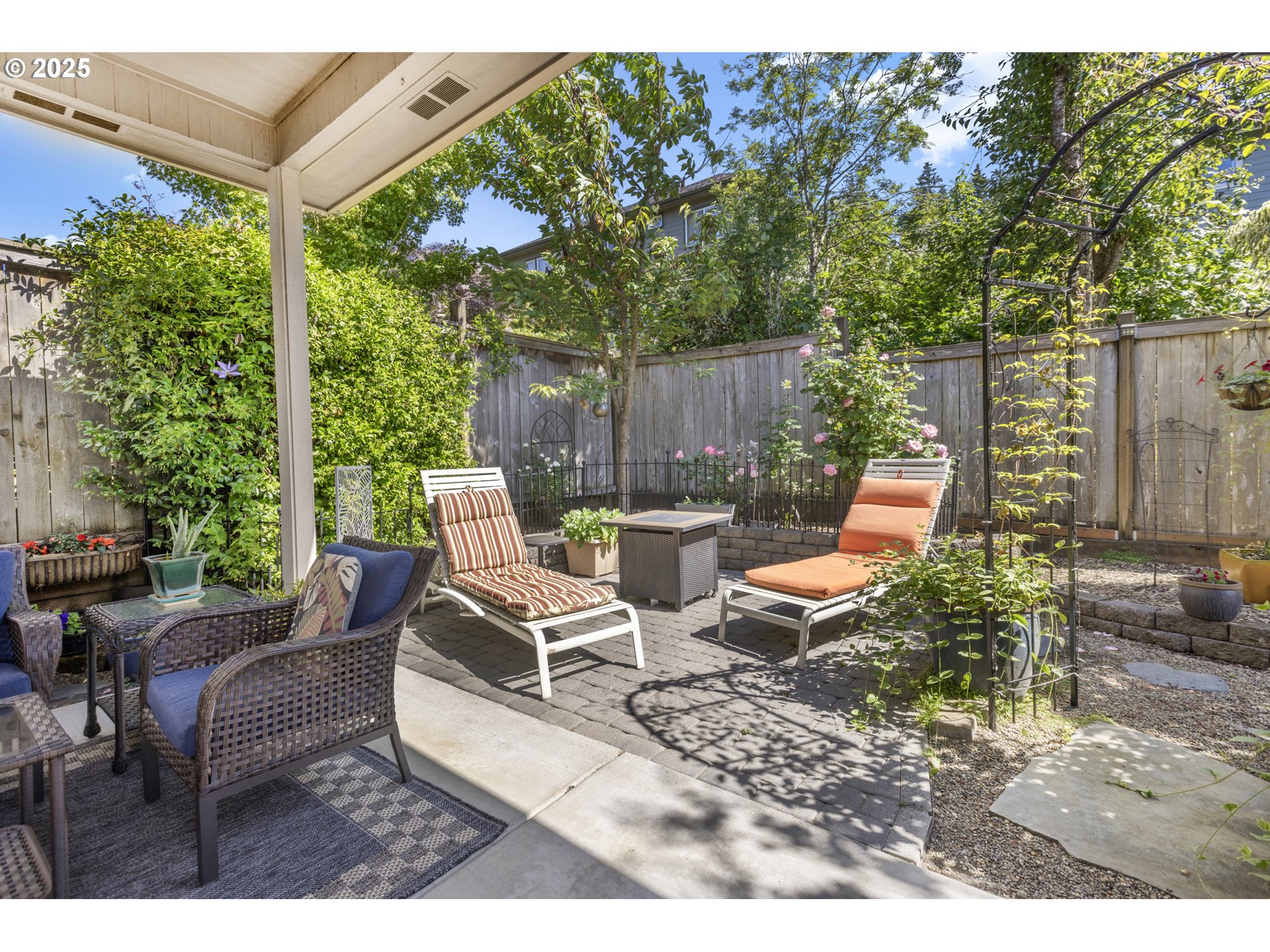 3369 Falcon Drive Springfield, OR 97477 - Photo 43 of 47 a view of a patio with table and chairs potted plants and large tree