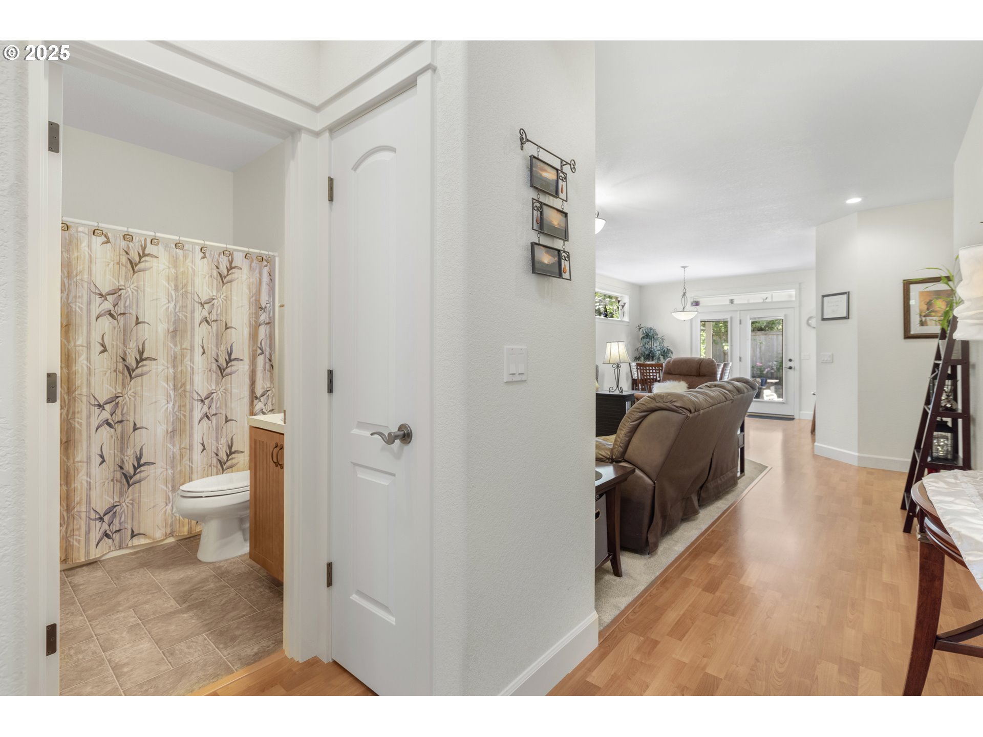 3369 Falcon Drive Springfield, OR 97477 - Photo 9 of 47 a view of a bedroom with a hardwood floor and a bathroom