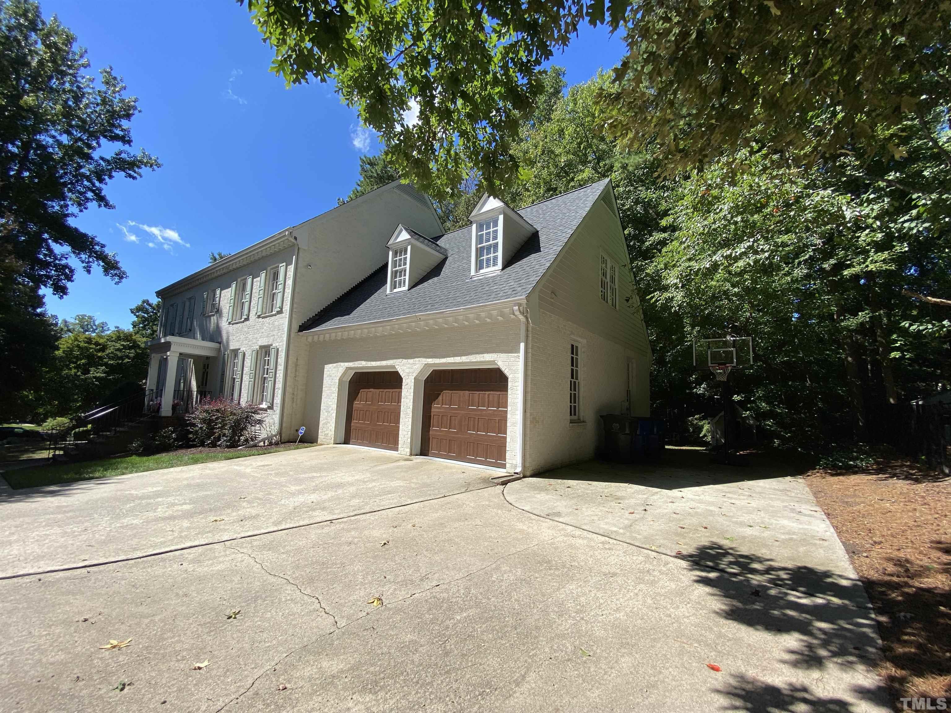 7313 Rainwater Road Raleigh, NC 27615 - Photo 2 of 30 a view of a house with a yard